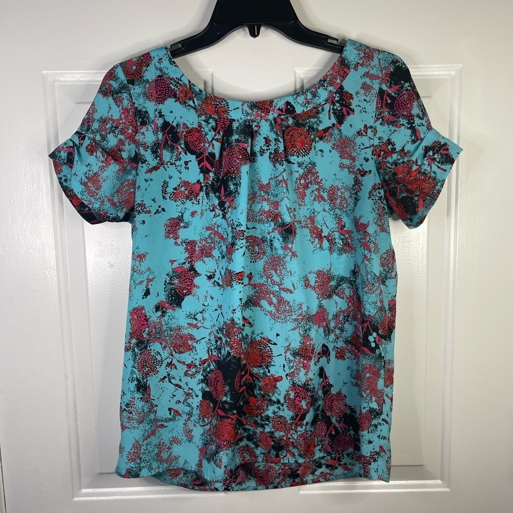 Kenzie short sleeve pattern blouse in blue and pink. Tie in the back